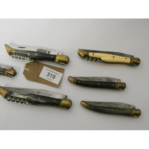 319 - A collection of vintage Laguiole pen knives