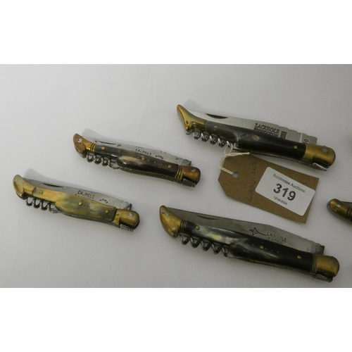 319 - A collection of vintage Laguiole pen knives