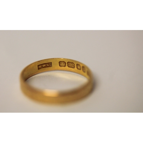 590 - A 22ct gold wedding band, size L, gross weight 2.1g