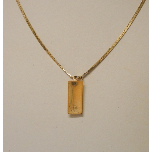 595 - A 14ct gold neck chain and a 14ct ingot style pendant, gross weight 5.6g