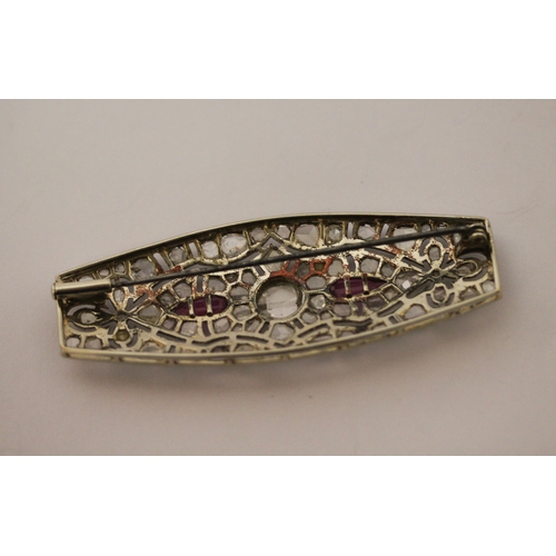 602 - A French platinum ruby and diamond large Art Deco style plaque brooch, with rose cut diamonds, eagle... 