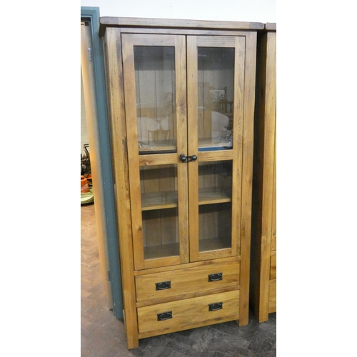 1 - A top quality light oak glazed two door bookcase with two drawers under, 2'9 wide