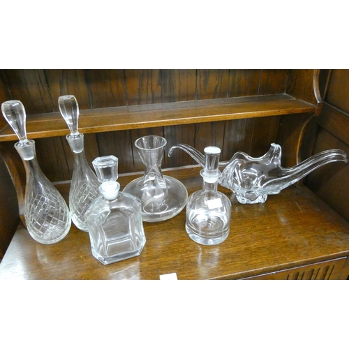 28 - A pair of glass decanters, two other, a carafe and a shaped glass fruit bowl