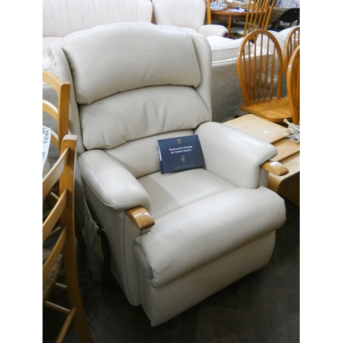 44 - HSL electric reclining easy chair in cream leather, with receipts etc