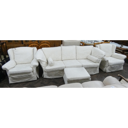 50 - A Chesterfield three seater settee three piece lounge suite in cream figured material with loose cus... 