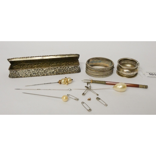 501 - An embossed silver pen box, agate handled pen, hat pins, silver bangle and a napkin ring