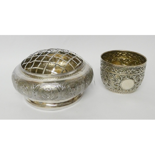 502 - An Eastern white metal rose bowl, 17cms across and an embossed white metal beaker or bowl. Gross wei... 