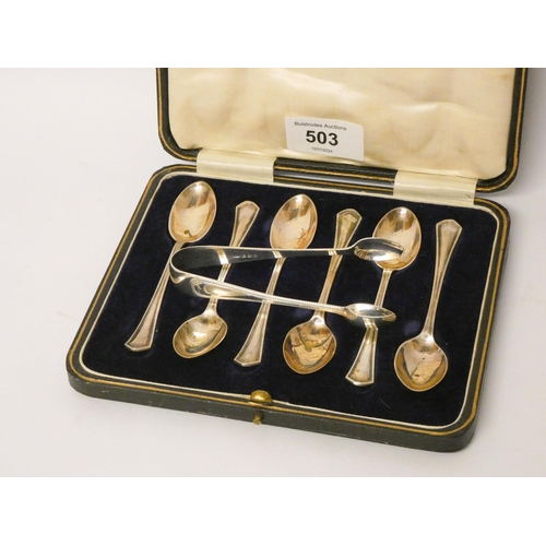 503 - A cased set of six silver tea spoons and a pair of sugar nips, 3 oz approx