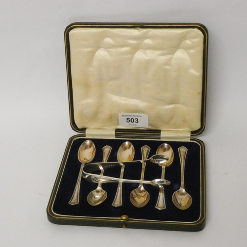 503 - A cased set of six silver tea spoons and a pair of sugar nips, 3 oz approx