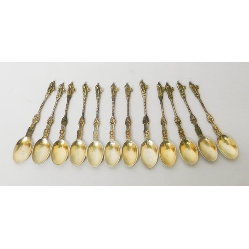 505 - A set of 12 Victorian silver gilt apostle ended tea spoons, hallmarked London 1880, Charles Boyton. ... 