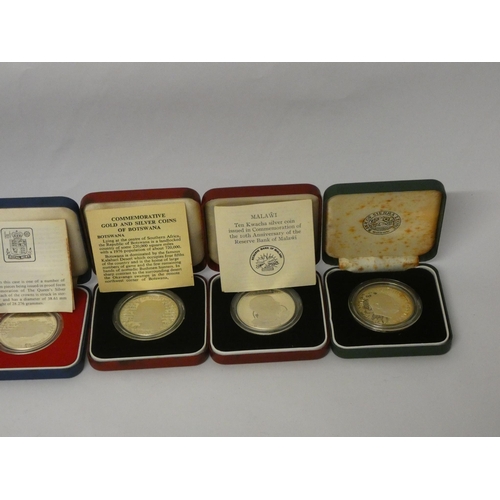 553 - Six cased silver Queen Elizabeth commemorative crowns