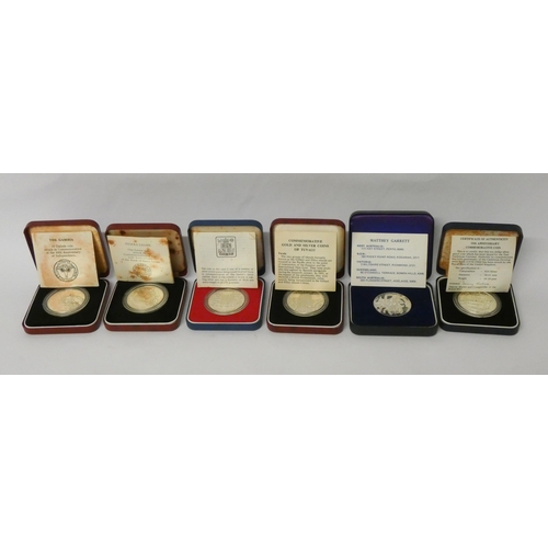 554 - Six cased silver Queen Elizabeth commemorative crowns