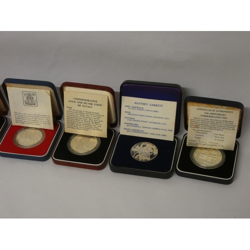 554 - Six cased silver Queen Elizabeth commemorative crowns