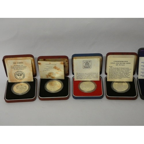 554 - Six cased silver Queen Elizabeth commemorative crowns