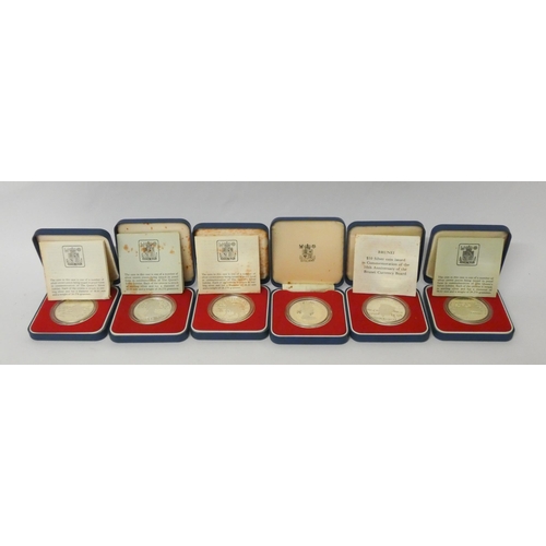 555 - Six cased silver Queen Elizabeth commemorative crowns