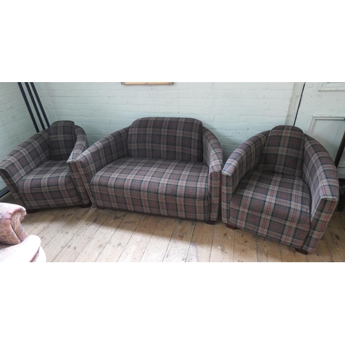 82 - An Ashbourne small two seater tub shaped settee lounge suite in wool tartan style covering