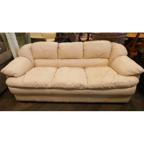 112 - A modern three seater settee in cream leather