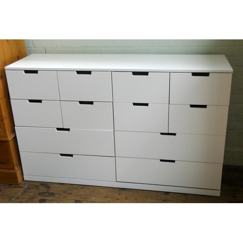 28 - A modern white finished chest of eight short and four long drawers, 5'3 wide