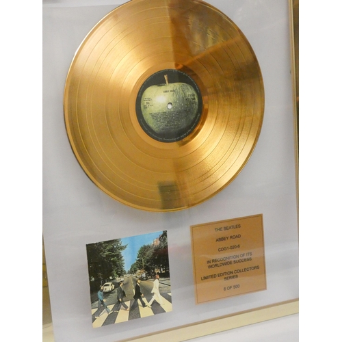 659 - The Beatles Abbey Road limited edition gold disc. Serial number CDG1-020-6, Number 6 of 500