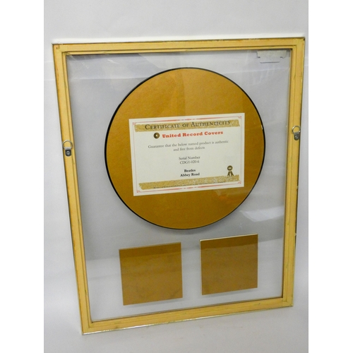 659 - The Beatles Abbey Road limited edition gold disc. Serial number CDG1-020-6, Number 6 of 500