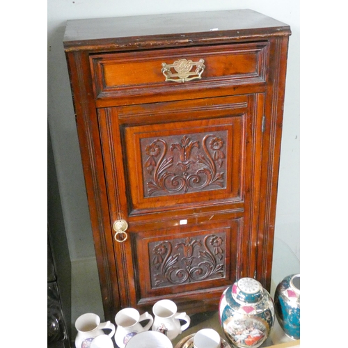 100 - An Edwardian walnut cupboard with fitted drawer 20