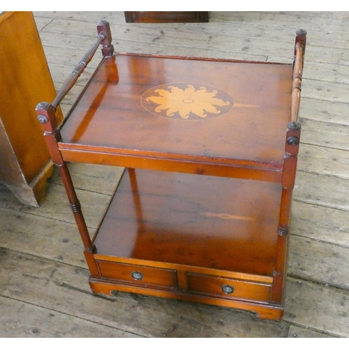 75 - An inlaid yew wood two tier drinks trolley