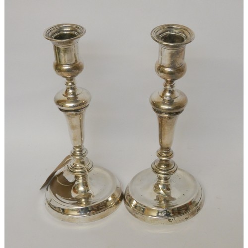 510 - A pair of  hallmarked silver candlesticks, London 1919