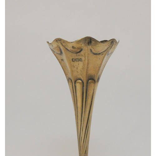 511 - A hallmarked silver posy vase, hallmarks for Sheffield 1902, together with a hallmarked silver napki... 