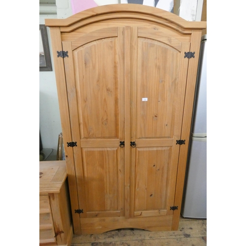 104 - A modern pine two door wardrobe with iron furniture, 3'2