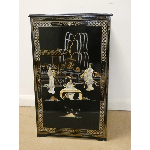 140 - A Chinese black lacquered and floral single door and lift top cabinet with applied mother of pearl p... 