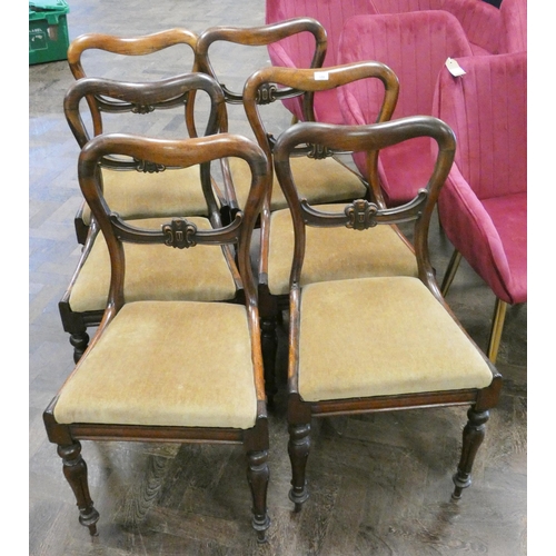 109 - A set of six Victorian rose wood dining chairs with gold upholstered seats, standing on reeded legs