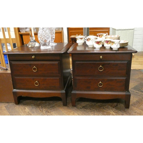 170 - A pair of Stag Minstrel mahogany beside chests each fitted two drawers