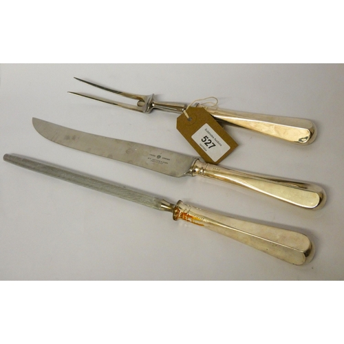 527 - A matching silver handled carving set, hallmarked Sheffield 1997