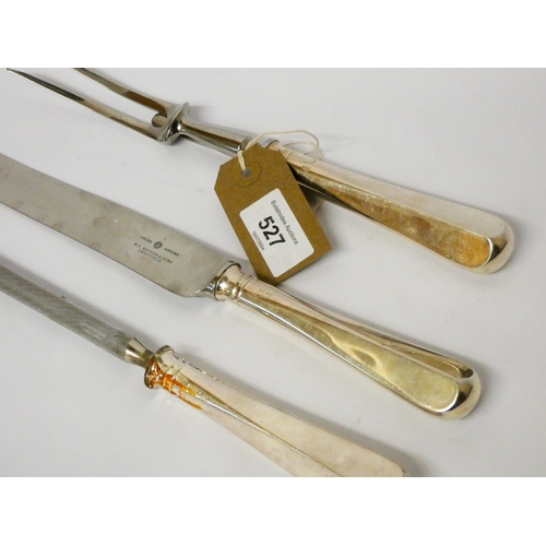 527 - A matching silver handled carving set, hallmarked Sheffield 1997