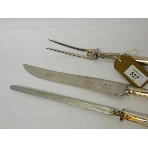 527 - A matching silver handled carving set, hallmarked Sheffield 1997