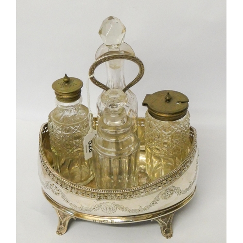 528 - Georgian silver boat shaped cruet stand with four associated glass bottles. Stand with wooden base l... 