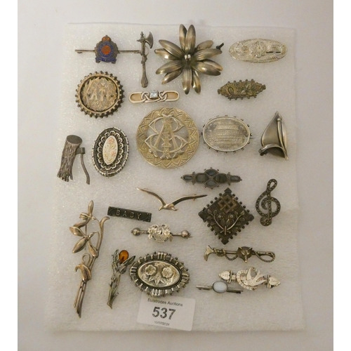 537 - A collection of Victorian and later silver brooches 24 in the lot