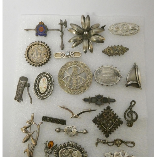 537 - A collection of Victorian and later silver brooches 24 in the lot