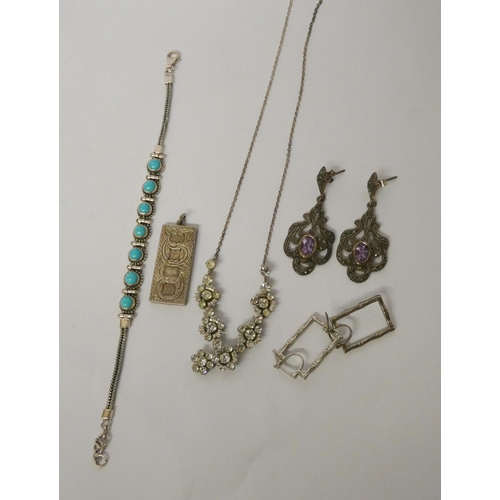 540 - A pair of amethyst and marcasite drop earrings, turquoise bracelet, silver ingot pendant etc