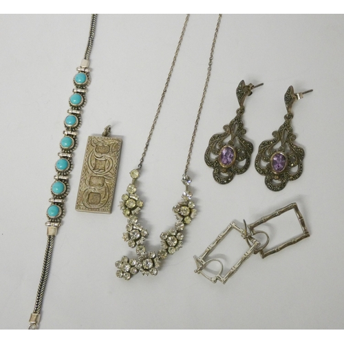 540 - A pair of amethyst and marcasite drop earrings, turquoise bracelet, silver ingot pendant etc