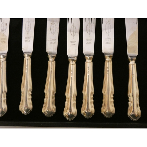 529 - A set of twelve silver handled fish knives and forks together with a pair of silver handled matching... 