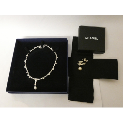 631 - Swarovski crystal necklace in box, and a pair of replica faux pearl costume earrings