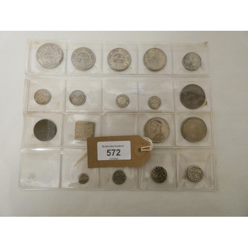 572 - Small collection of mostly silver coins to include Kruger South African half crown, 2 shillings, shi... 