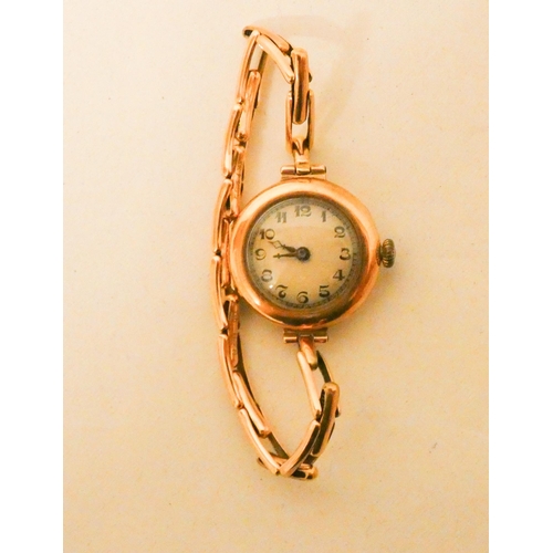 582 - Ladies vintage 9ct gold cased wristwatch on flexible strap, case hallmarked, strap marked 9ct. Gross... 