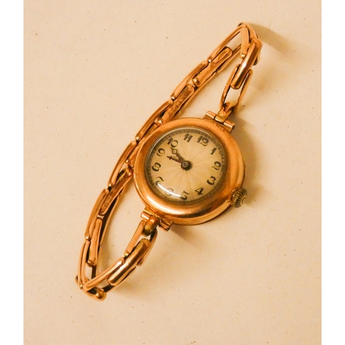 582 - Ladies vintage 9ct gold cased wristwatch on flexible strap, case hallmarked, strap marked 9ct. Gross... 