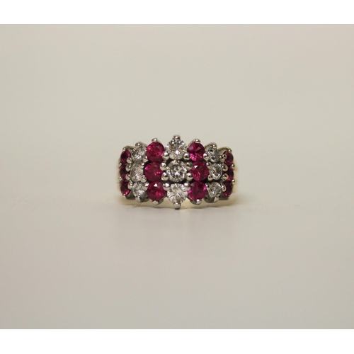 604 - A modern ruby and diamond set wide band dress ring, on hallmarked 18ct yellow gold band, ring size N... 