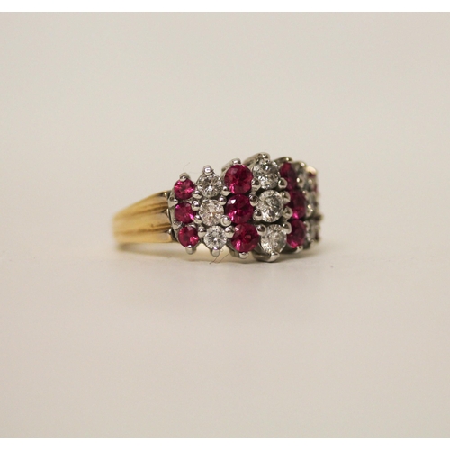 604 - A modern ruby and diamond set wide band dress ring, on hallmarked 18ct yellow gold band, ring size N... 