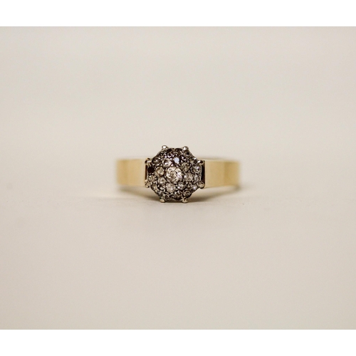 611 - A large diamond cluster ring, on yellow gold band marked '18ct'. Ring size U, gross weight 6.1g