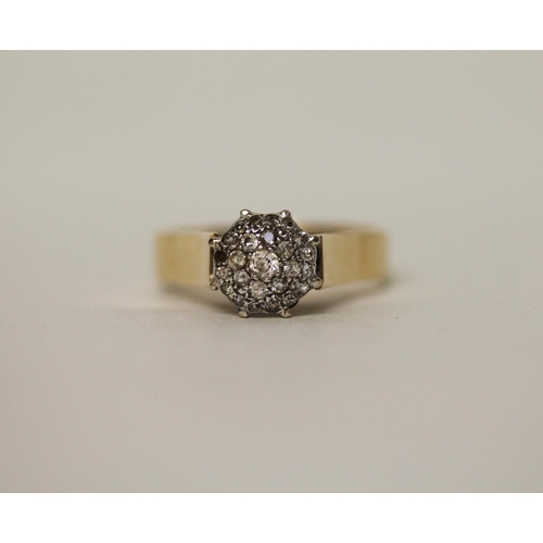 611 - A large diamond cluster ring, on yellow gold band marked '18ct'. Ring size U, gross weight 6.1g