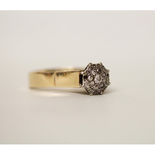 611 - A large diamond cluster ring, on yellow gold band marked '18ct'. Ring size U, gross weight 6.1g